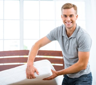 bigstock-Young-man-near-white-bed-112280666.jpg