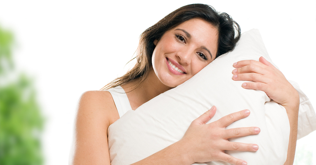 woman with soft white pillow