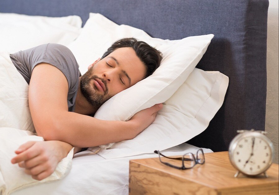 bigstock-Handsome-man-sleeping-in-his-b-133364666
